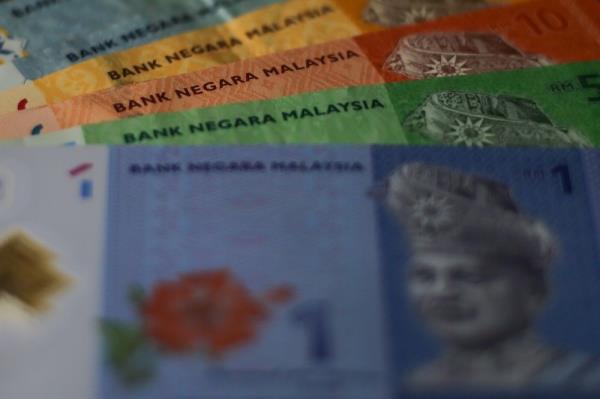 Ringgit opens higher against US dollar on dovish Fed comments