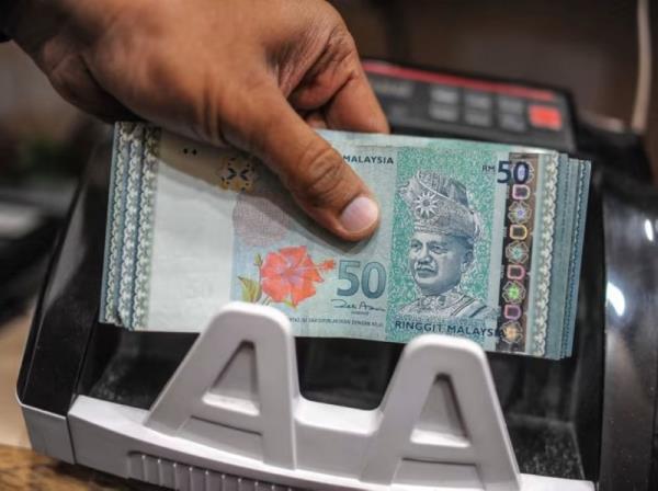 Ringgit opens higher against US dollar as investors view mixed signals